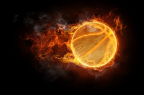 Hình ảnh biểu tượng quả bóng thể thao cháy trên nền đen